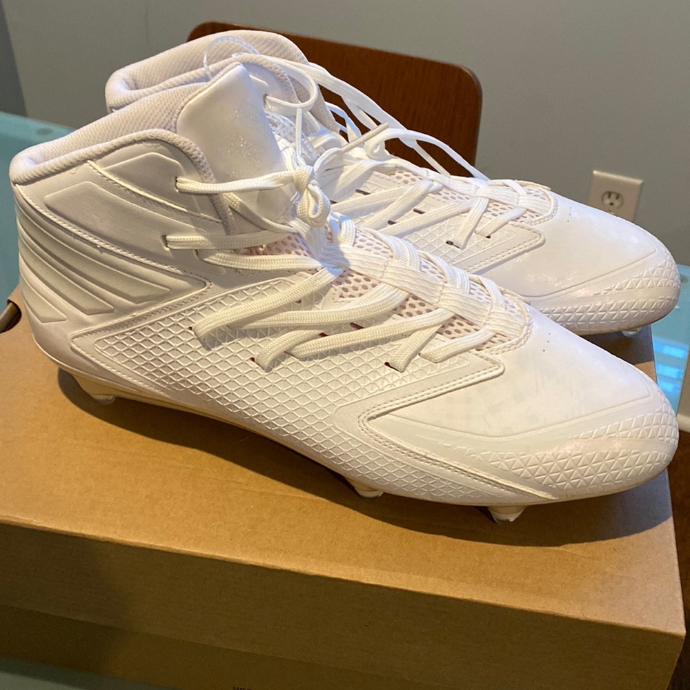 Adidas football cleats. New without tags